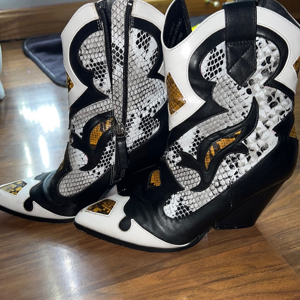 Snake pointed toe boots